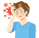 激しい頭痛で苦しむ青年（群発頭痛）