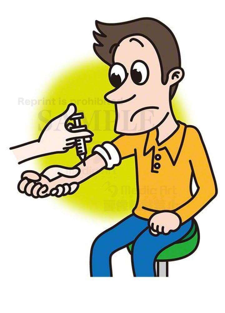 予防接種を受けている男性